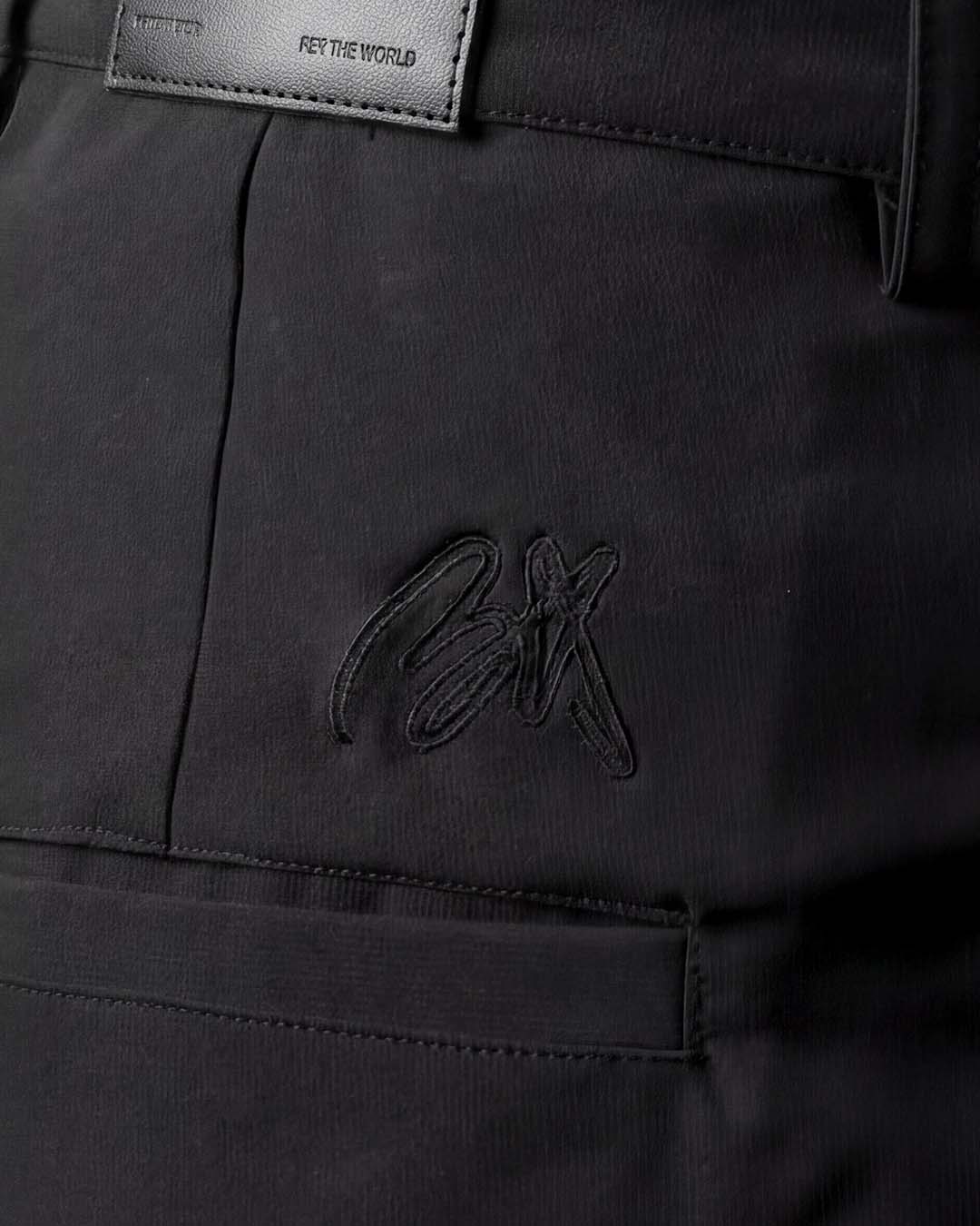 FLOWING PLEATED TROUSERS